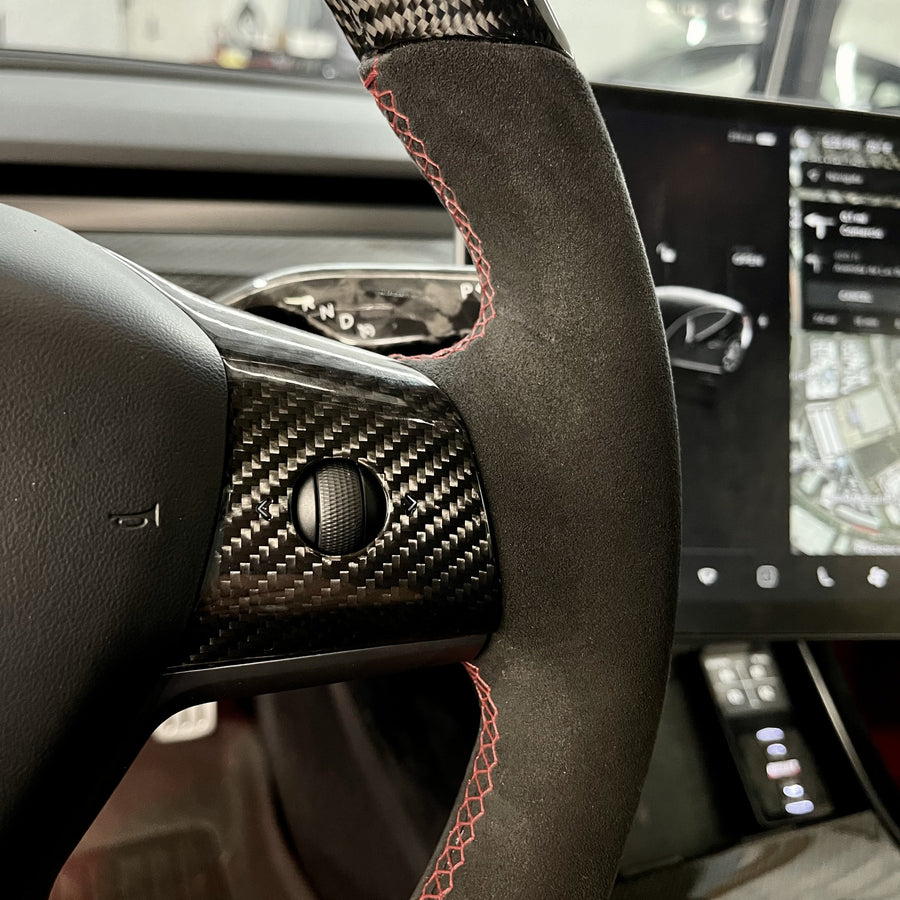 Alcantara steering wheel wrap and hand stitching is the best.. cuts down on  hot steering wheel too. : r/TeslaModel3